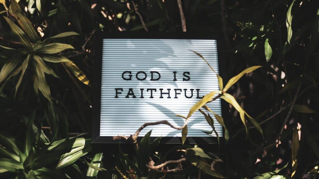 God is Faithful signage with leaved background, fruitfulness of the womb