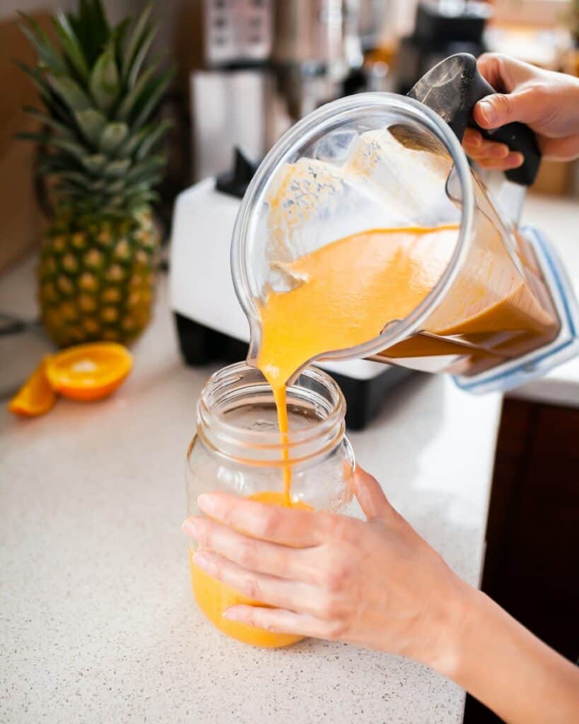 pineapple juice in clear plastic cup, meal replacement shakes